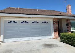 Two-car garage door on a Florida home exterior